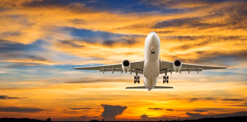 avion puesta de sol