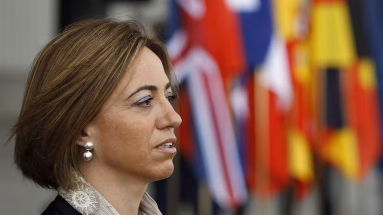 Spanish Defence Minister Carme Chacon attends the signing of the A400M contract amendment finalised with customer nations in Seville April 7, 2011. European nations have given formal backing to a 3.5 billion euro ($5 billion) rescue deal for Airbus's A400M military lifter, ending a drawn-out battle to save Europe's largest defence project.  REUTERS/Marcelo del Pozo (SPAIN - Tags: MILITARY BUSINESS TRANSPORT POLITICS)