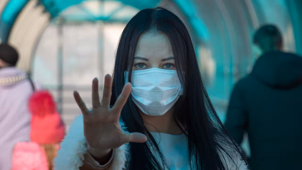 coronavirus covid-2019 Girl in mask on the street. Stop pandemic and panic