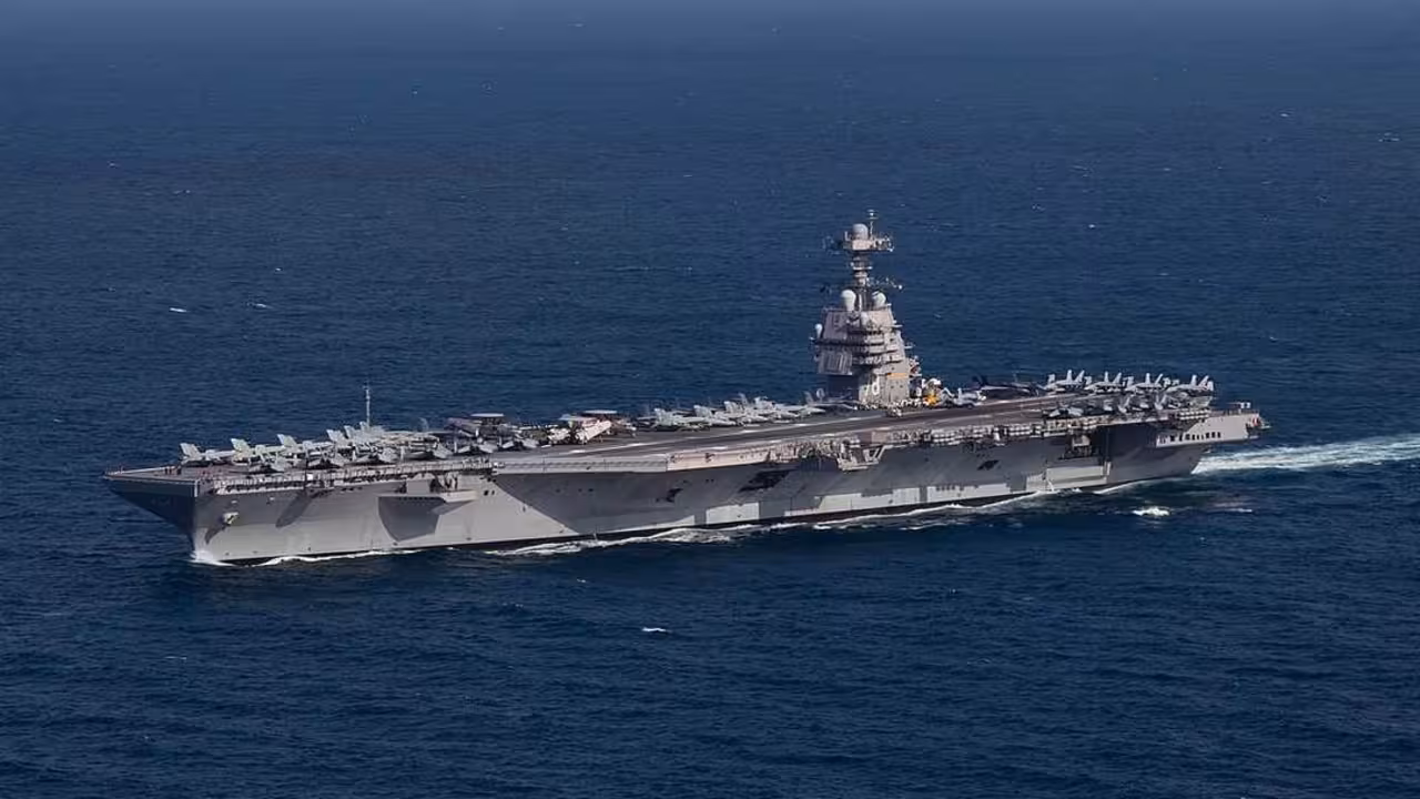 221009-N-TL968-1248 ATLANTIC OCEAN (Oct. 9, 2022) The first-in-class aircraft carrier USS Gerald R. Ford (CVN 78) steams the Atlantic Ocean during a simulated straits transit with the Gerald R. Ford Carrier Strike Group (GRFCSG) in the Atlantic Ocean, Oct. 9, 2022. The Gerald R. Ford Carrier Strike Group is deployed in the Atlantic Ocean, conducting training and operations alongside NATO Allies and partners to enhance integration for future operations and demonstrate the U.S. Navy's commitment to a peaceful, stable and conflict-free Atlantic region. (U.S. Navy photo by Mass Communication Specialist 2nd Class Jackson Adkins)
